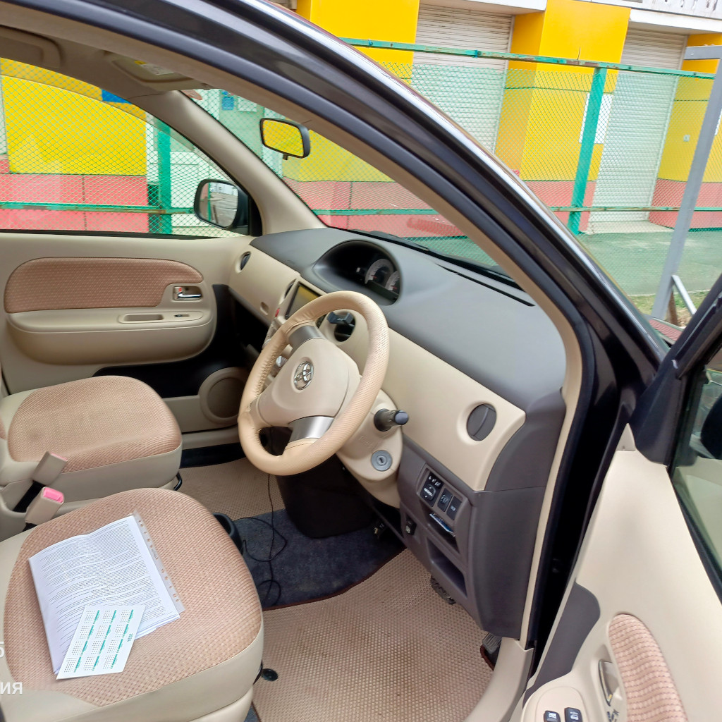 Toyota Sienta - фото 8